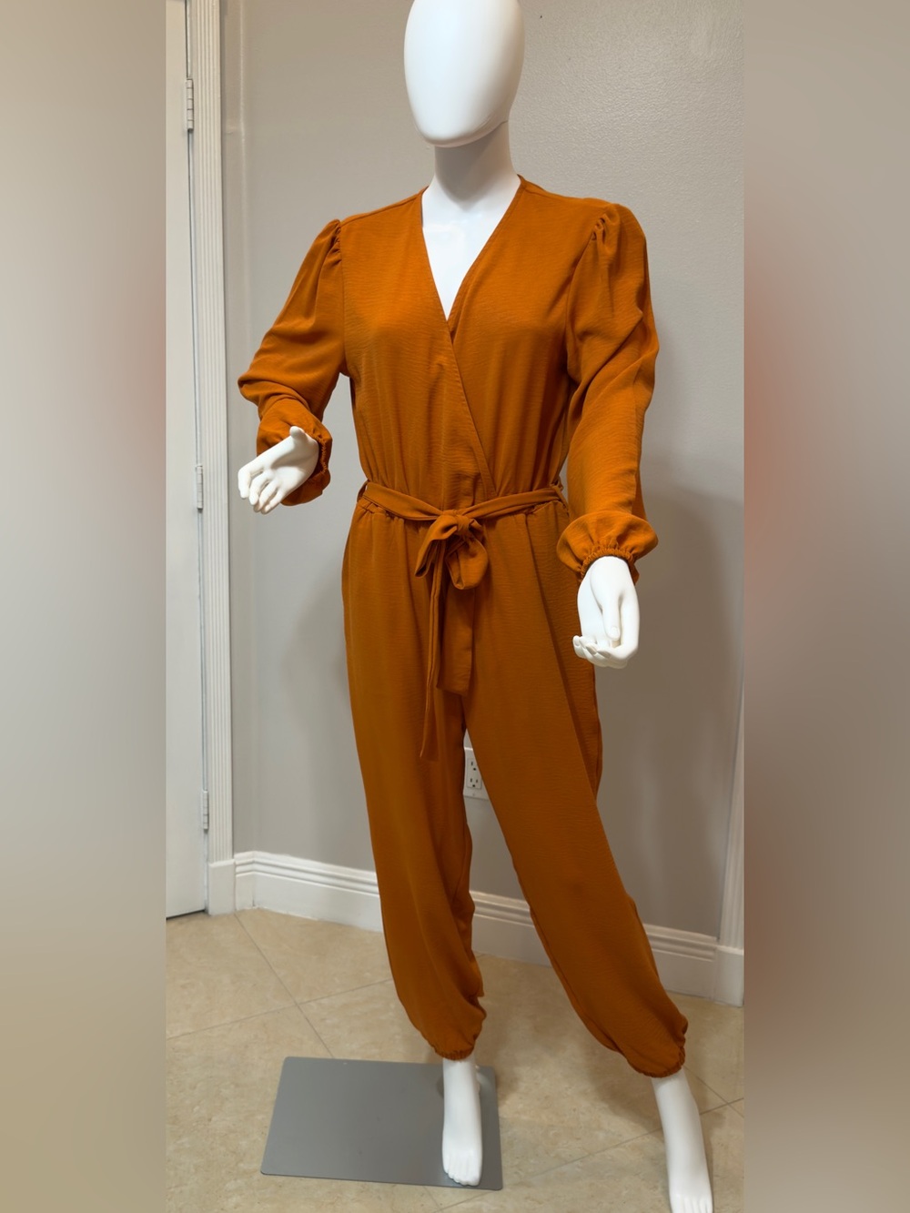 Pretty Garden Chic Women's Long Sleeve Tie-Waist Jumpsuit - Rust Medium.